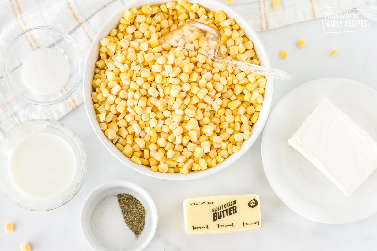 Frozen corn, butter, cream cheese, salt, pepper, sugar and milk for Creamed Corn.