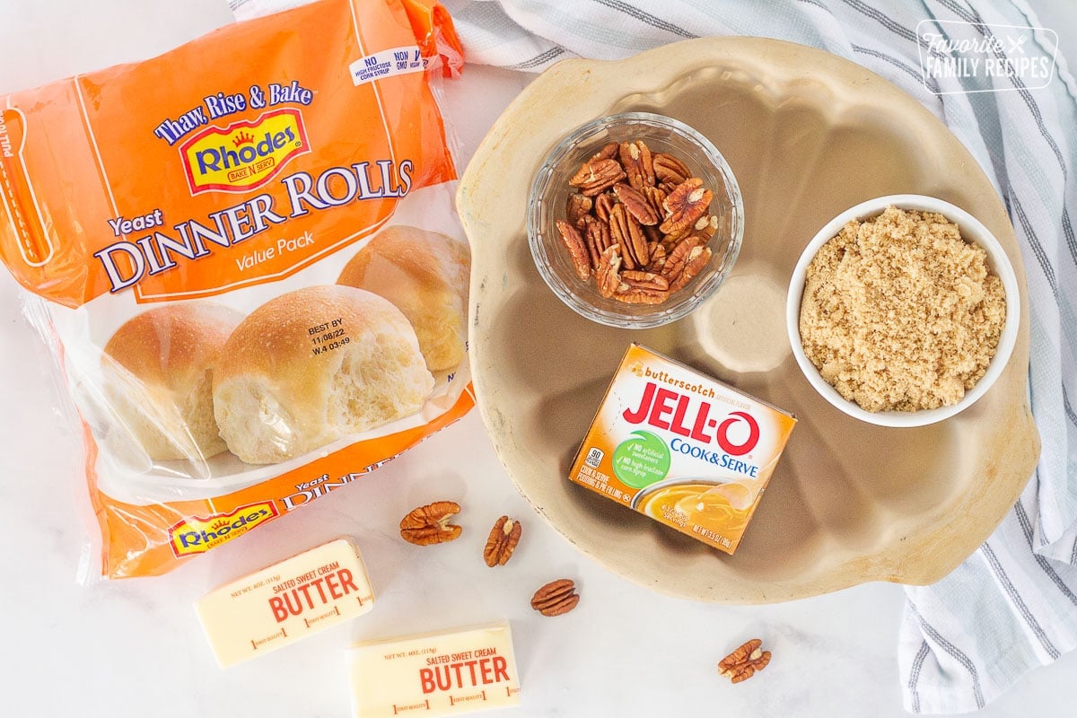 Bag of frozen dinner rolls, pecans, brown sugar, butterscotch jello pix, butter and a bundt pan to make Easy Monkey Bread.