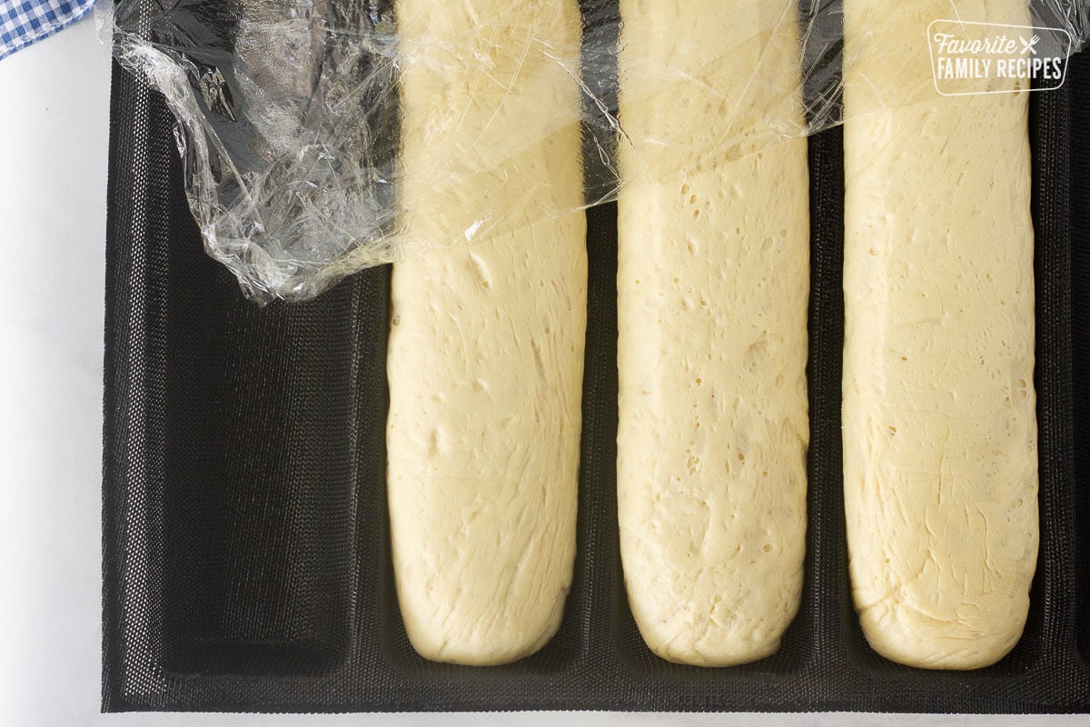 Three loaves of Subway Bread dough risen.