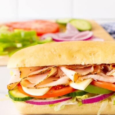 Side view of an assembled Subway Bread sandwich.