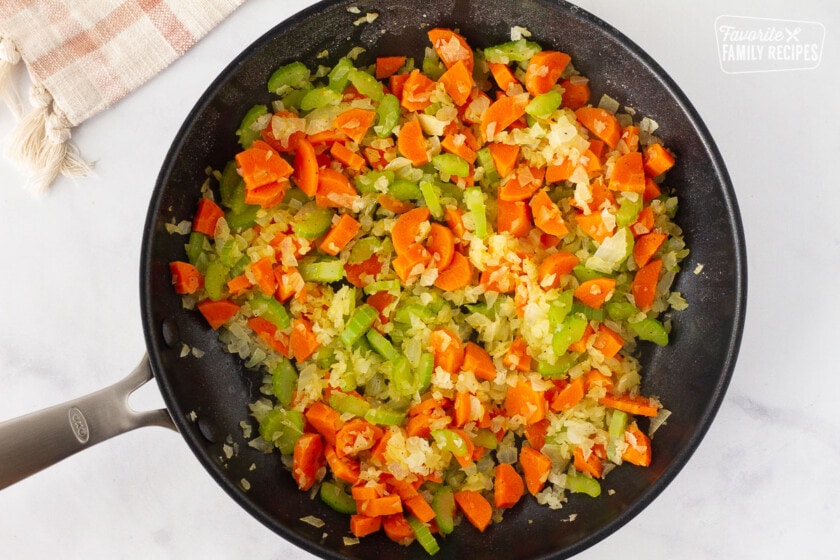 Vegetables in a skillet for Easy Turkey Pot Pie.