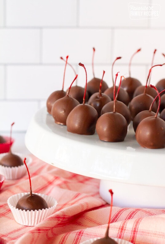 Stand of Chocolate Covered Cherries with more Chocolate Covered Cherries under the stand.