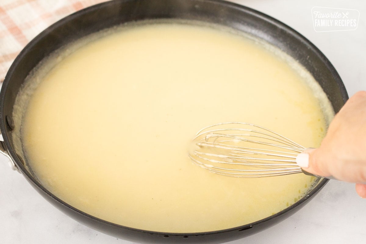 Whisking sauce for Turkey Pot Pie filling.