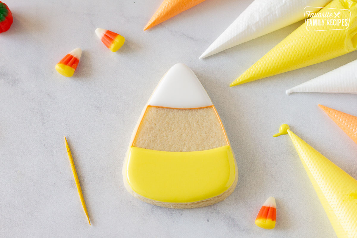 White and yellow icing added for a Candy Corn Halloween cookie.