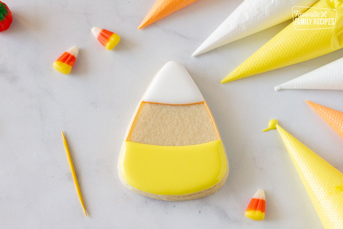 White and yellow icing added for a Candy Corn Halloween cookie.