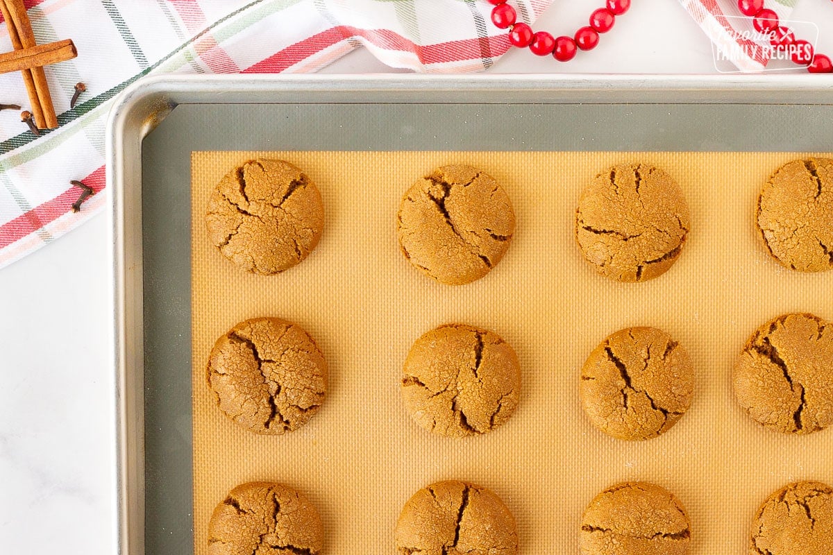 Cookie sheet of baked Molasses Cookies.