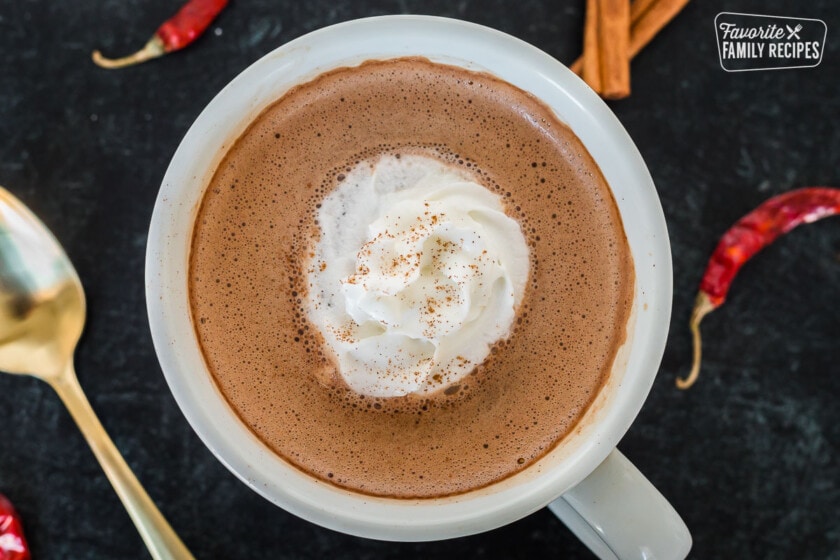 A mug of Mexican hot chocolate with whipped cream