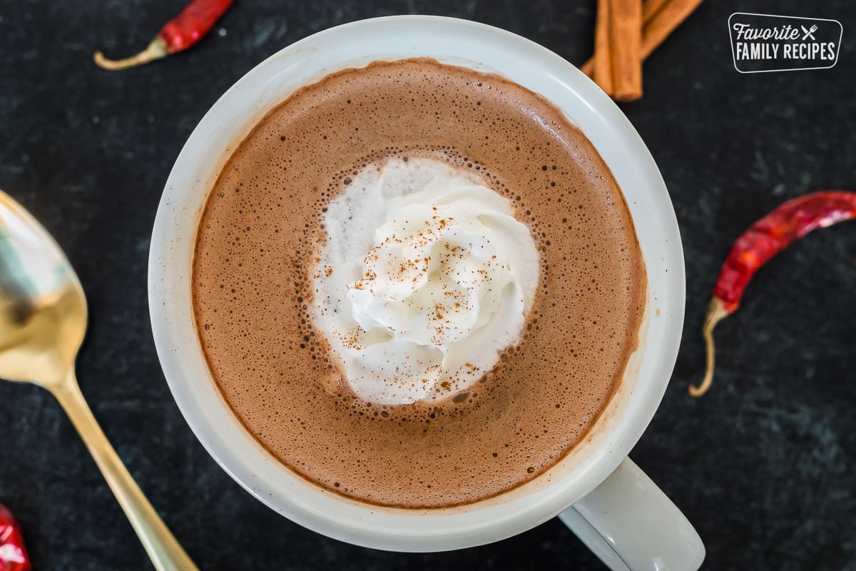 A mug of Mexican hot chocolate with whipped cream