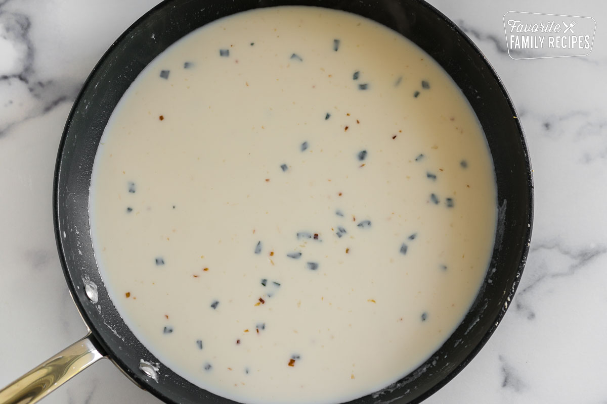 cream sauce with sage in a large skillet