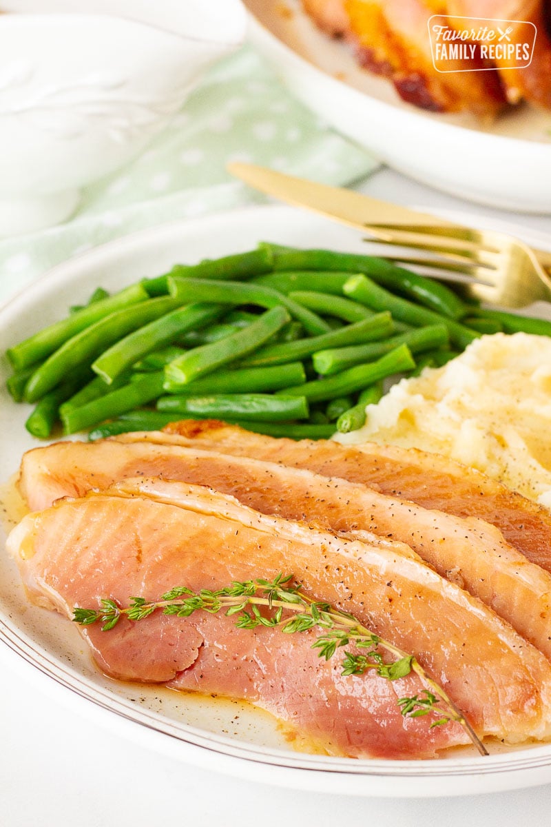 Close up of Slow Cooker Spiral Ham slices.