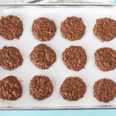 Cooled Easy No Bake Cookies on a cookie sheet.