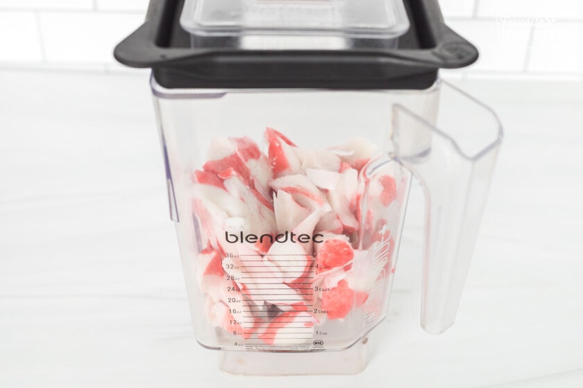 Crab meat pieces in a blender.