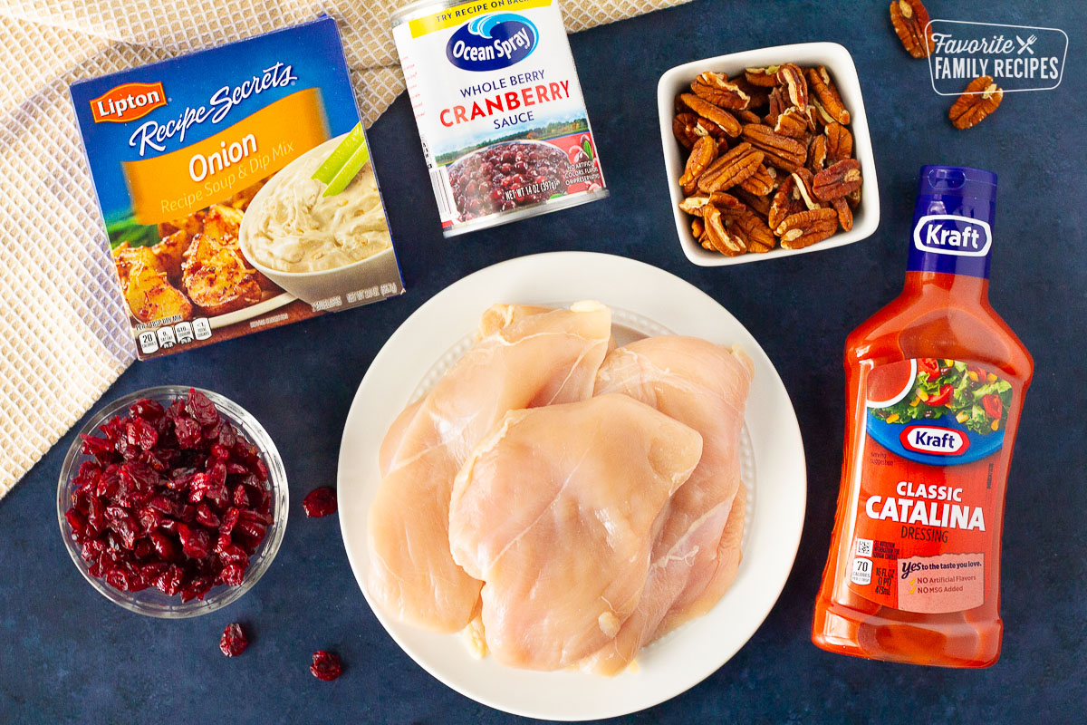 Craisins, onion soup mix, cranberry sauce, pecans, chicken and Catalina dressing to make Cranberry Chicken.
