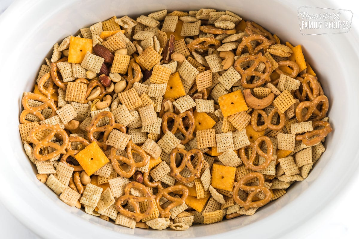 Chex Mix ingredients in a crockpot