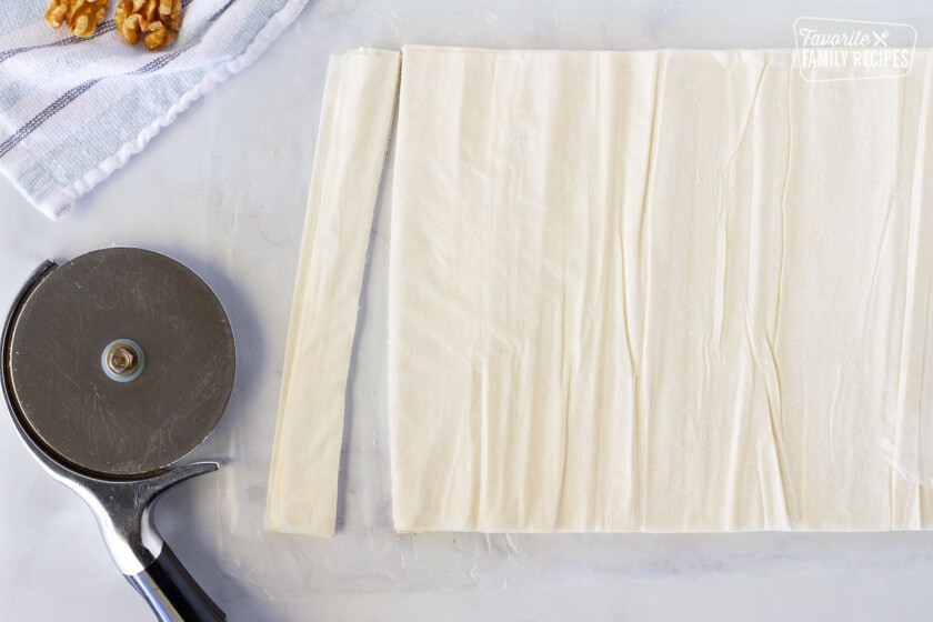Phyllo dough sliced with a pizza cutter for Baklava.