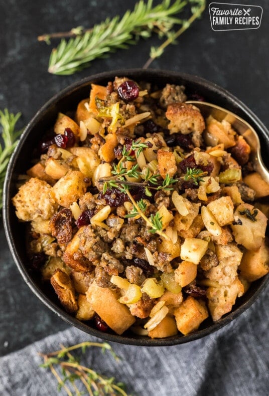 Gluten free stuffing in a black ceramic bowl