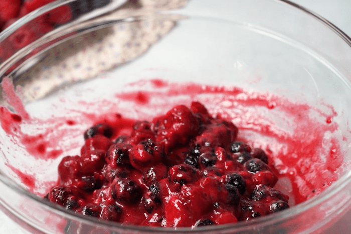 Ingredients mixed in a bowl for Easy Berry Pie.