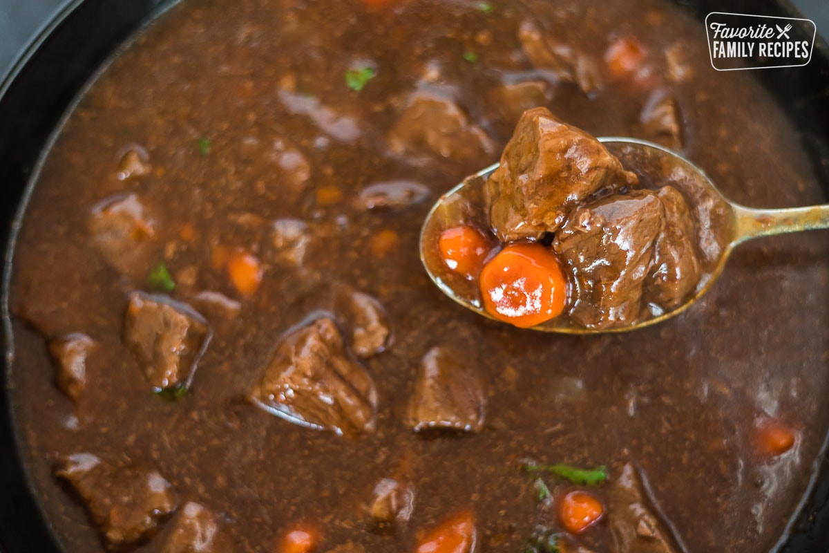 A close-up of a spoonful of beef goulash
