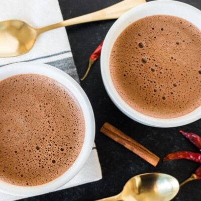 Two mugs of Mexican hot chocolate