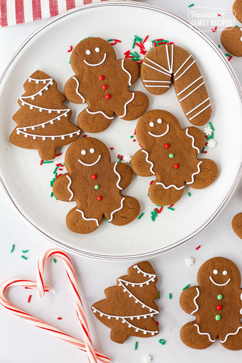 Plate of Gingerbread Cookies with gingerbread men, Christmas trees and candy canes.