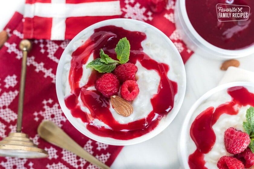 A bowl of risalamande with warm raspberry sauce