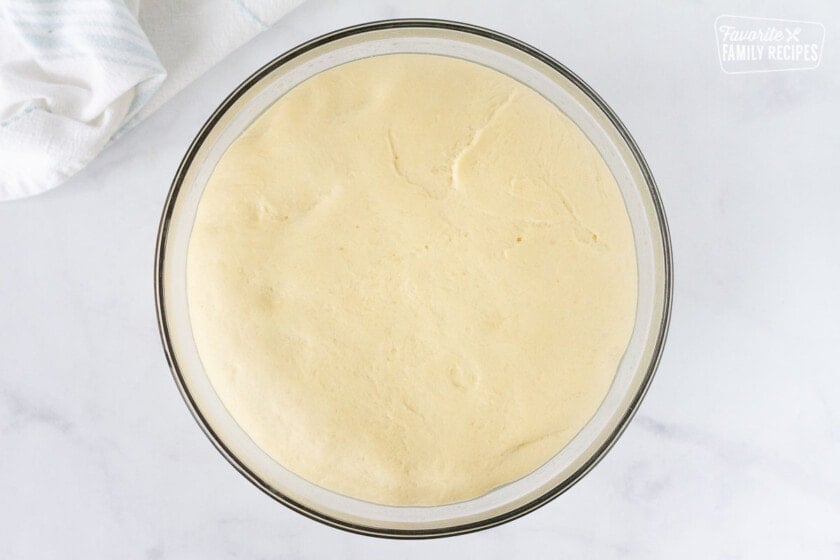Bowl of risen Homemade Crescent Roll dough.