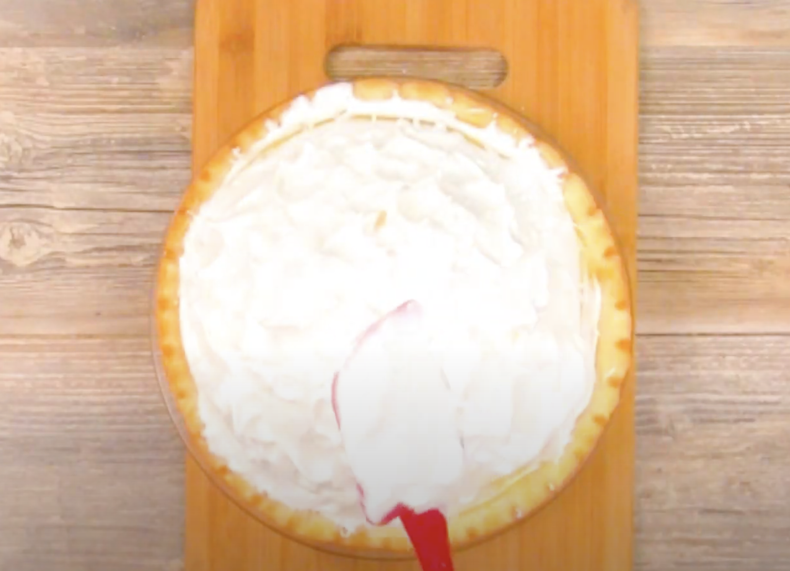 Top pie with meringue and bake at 325 about 10 minutes or until meringue is lightly browned.