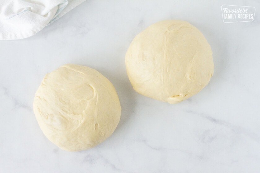 Two balls of Homemade Crescent Roll dough.