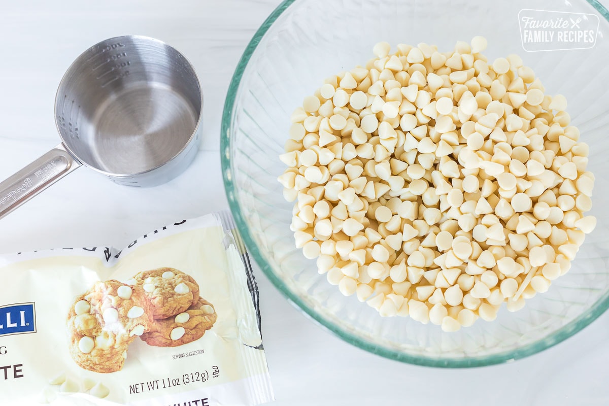 White chocolate chips in a large glass bowl