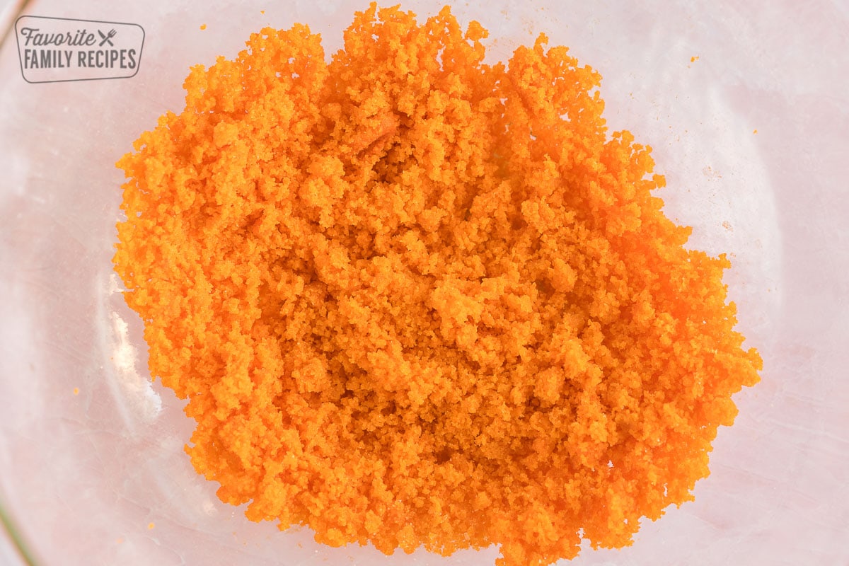 tang powder and vanilla extract mixed together in a bowl