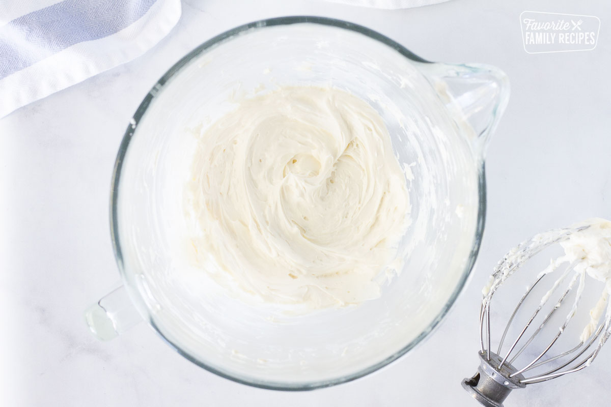 Mixing bowl with whipped cream cheese.