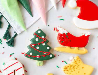 Six Christmas Sugar Cookies with bagged royal icing.