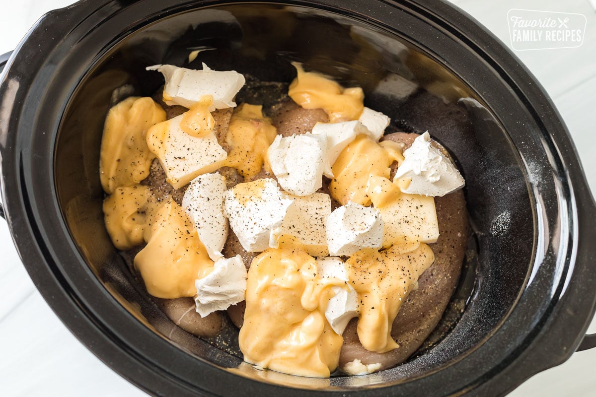 Chicken, butter, cream cheese, Italian seasoning, and cream of chicken soup in a Crockpot