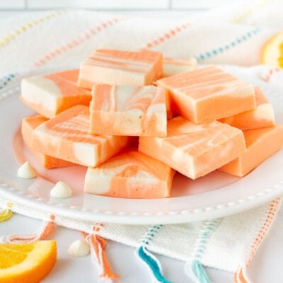 Plate of cut up cubes of Orange Vanilla Fudge.