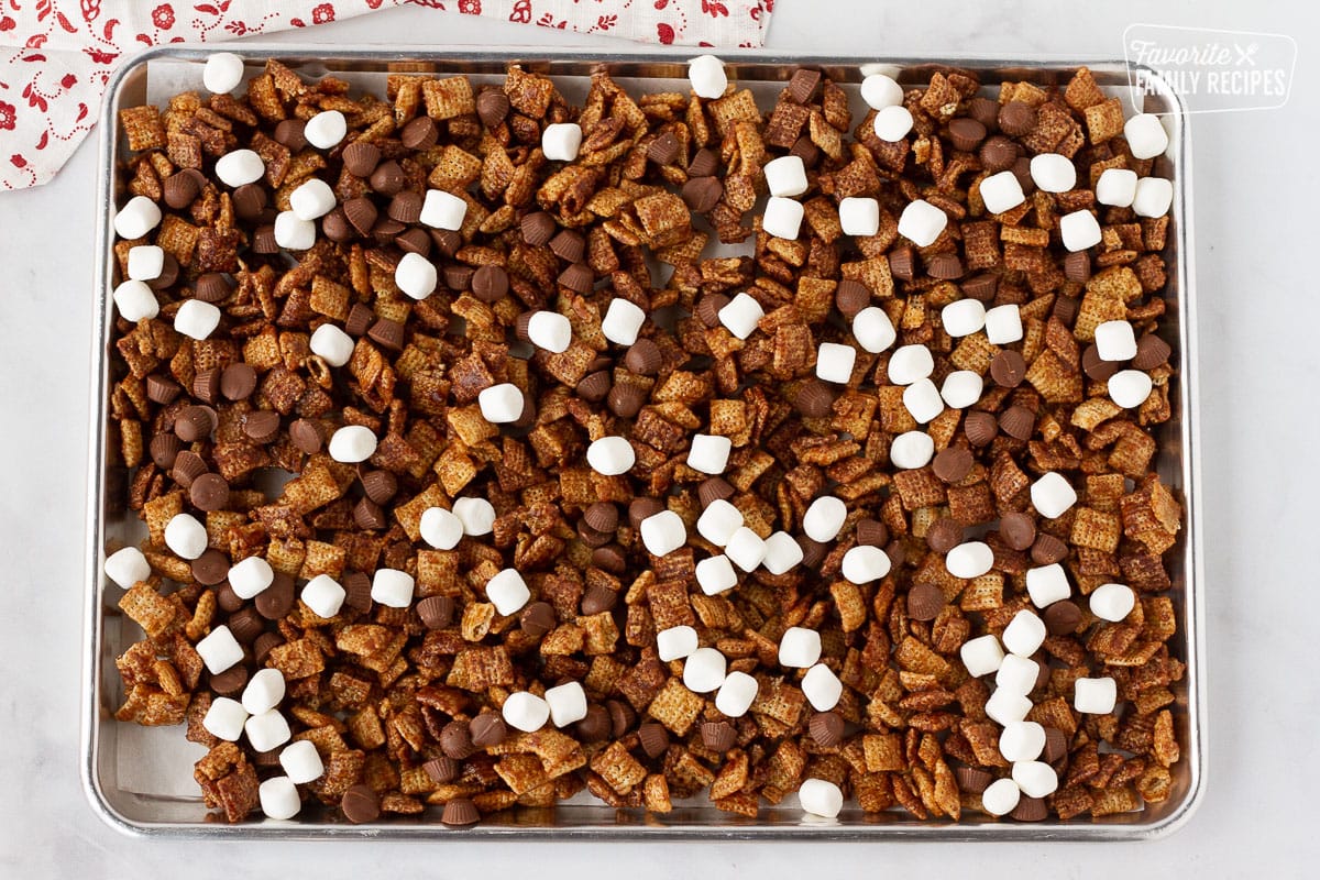 Pan of Sweet Chex Mix with marshmallows and peanut butter cups.