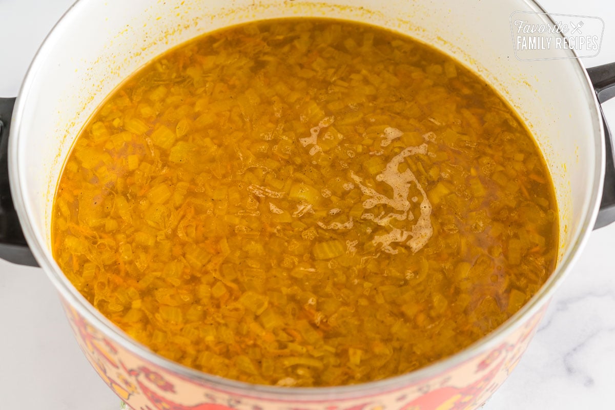 Mulligatawny soup broth in a pot