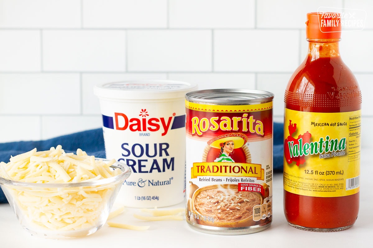 Refried beans, Valentina salsa picante, sour cream and Monterey Jack cheese for Restaurant Style Refried Beans.