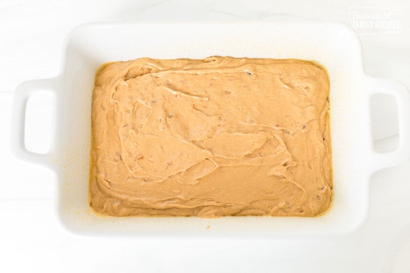 Cake batter in a baking pan ready to be baked