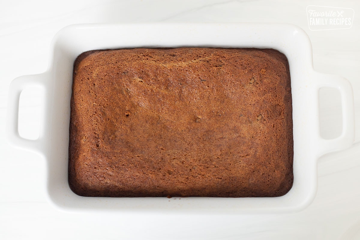 A baked cake in a baking dish