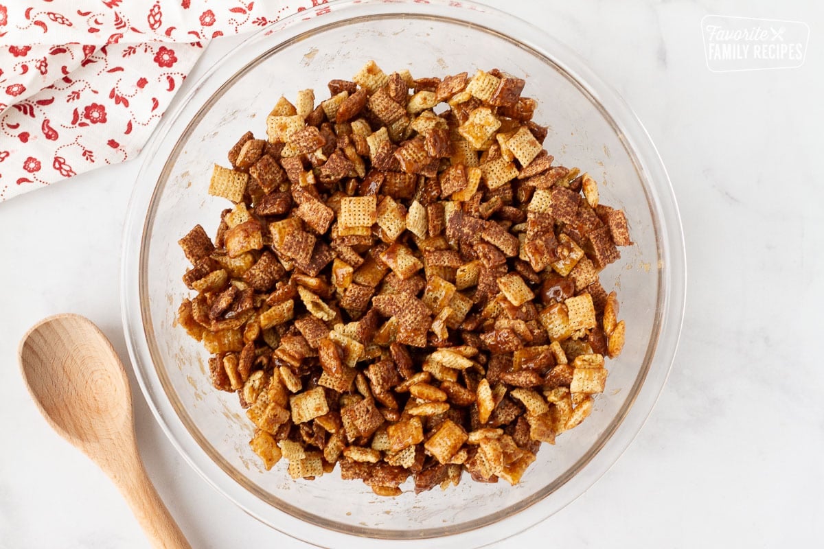 Bowl of Chocolate Chex coated in brown sugar and butter mixture.