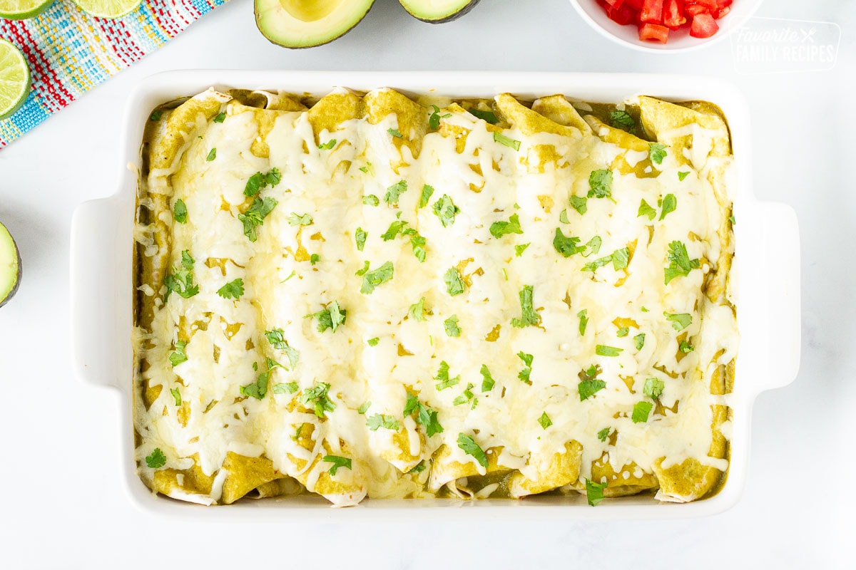 Baked Spinach Enchiladas in a baking dish.