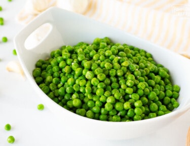 How to Cook Frozen Peas served in a bowl.