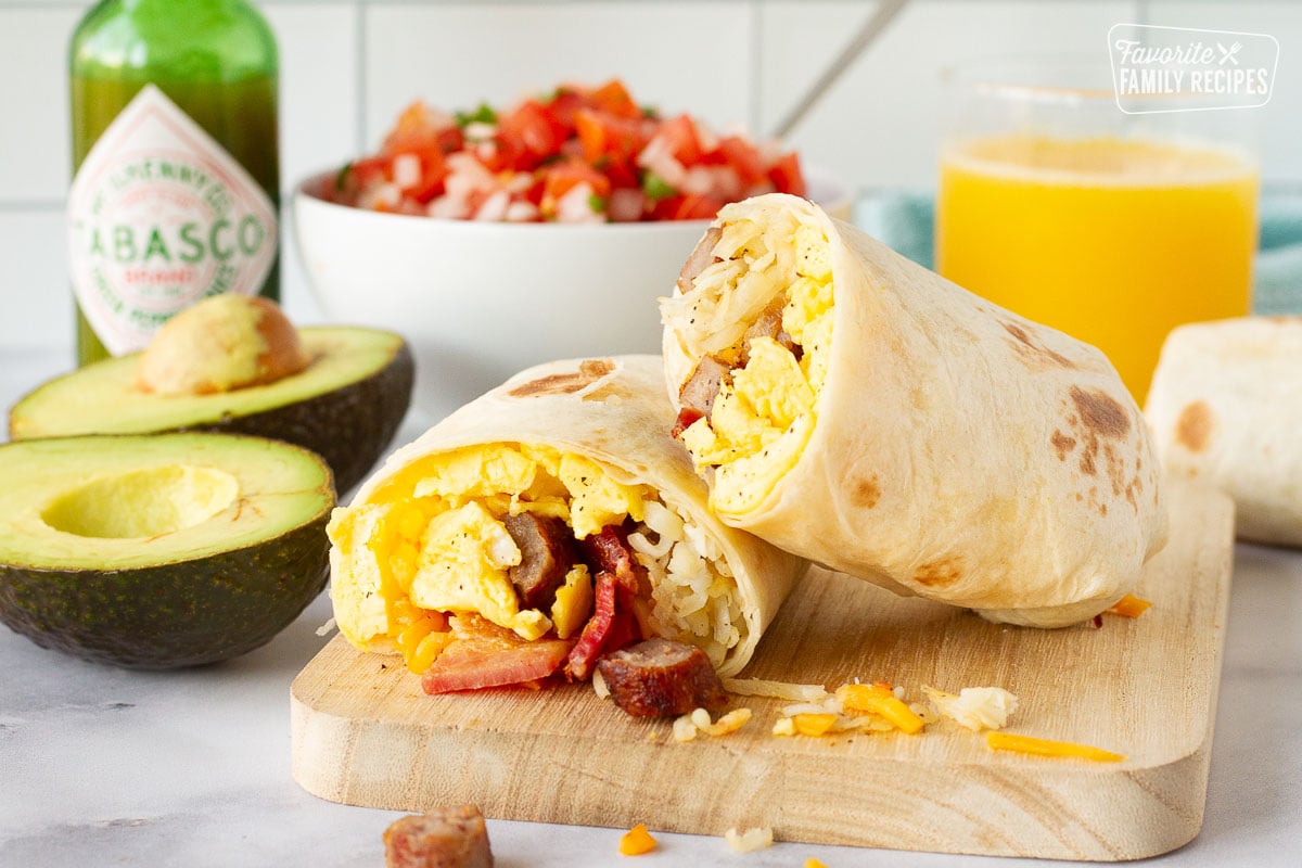 A breakfast burrito filled with eggs, bacon, and sausage
