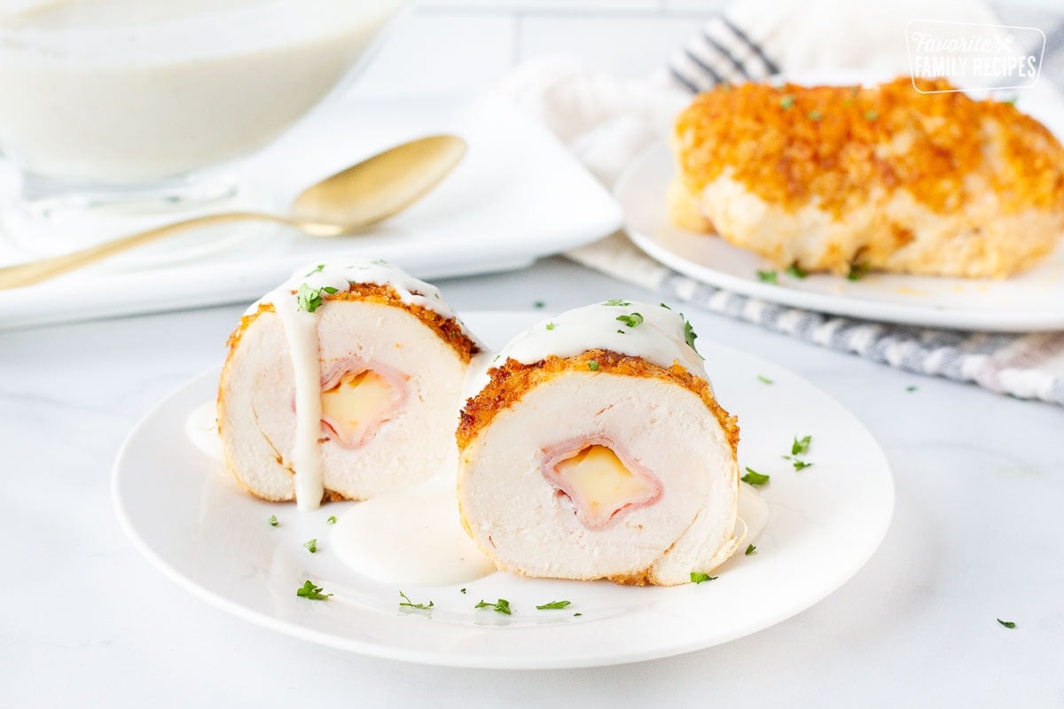 Chicken Cordon Bleu Sauce over two halves of Chicken Cordon Bleu.