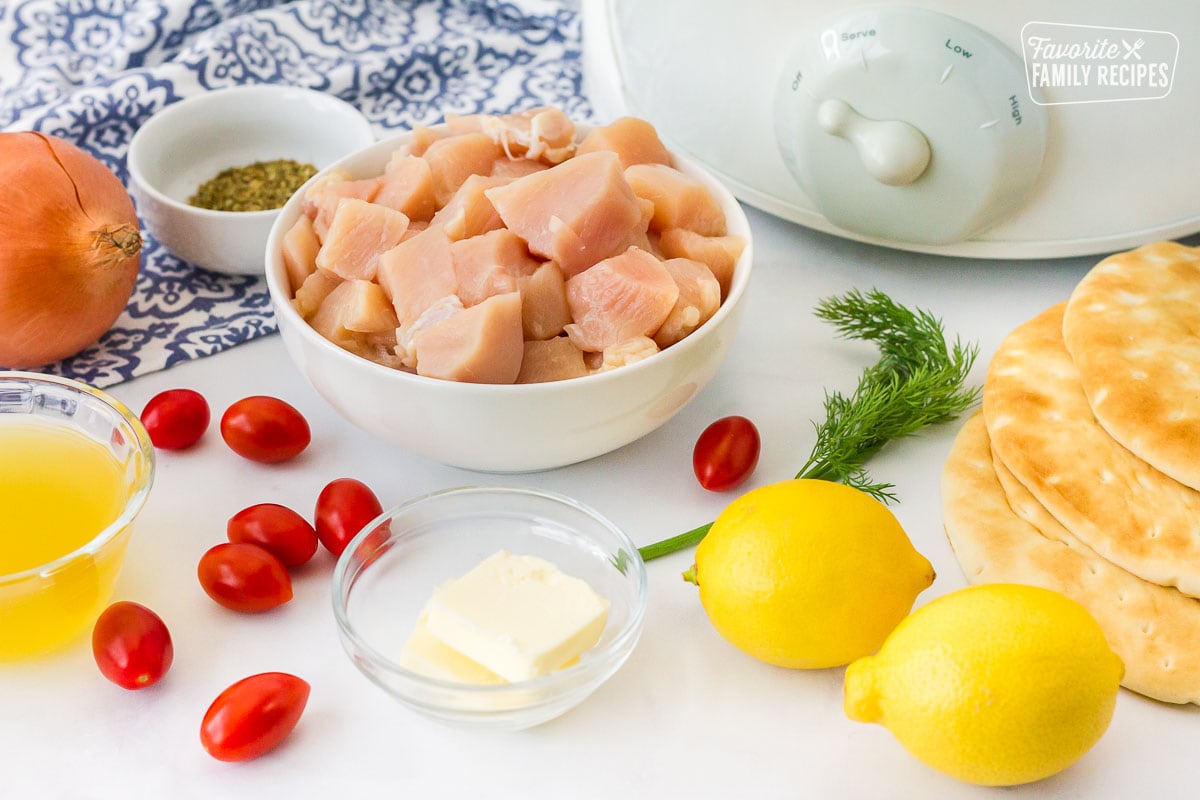 Ingredients for Chicken Gyro including chicken, onion, oregano, tomatoes, chicken broth, lemons, dill and flat bread.