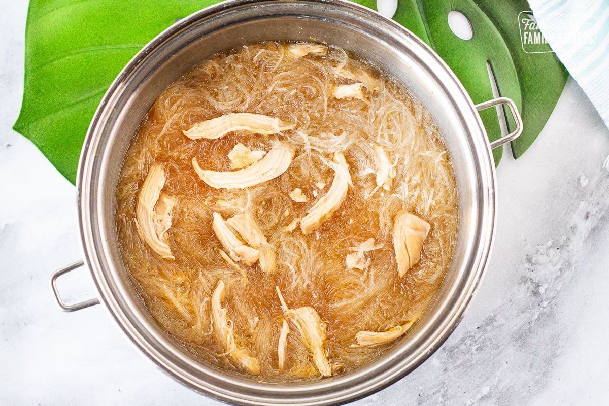Pot of cooked Hawaiian Style Chicken Long Rice Noodles.