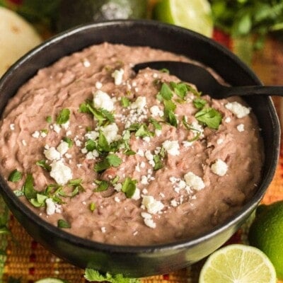 A ceramic bowl with homemade refried beans