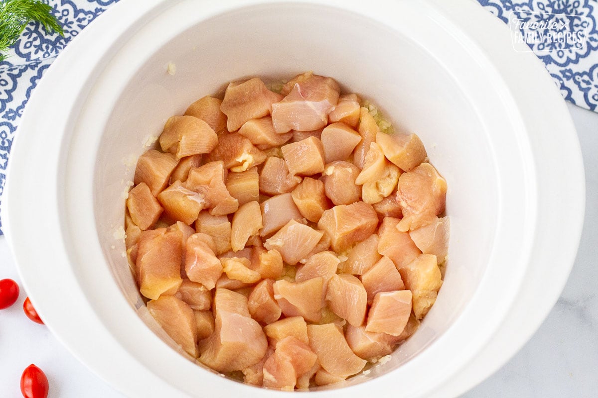 Cut up chicken breast in a crockpot to make Chicken Gyros.