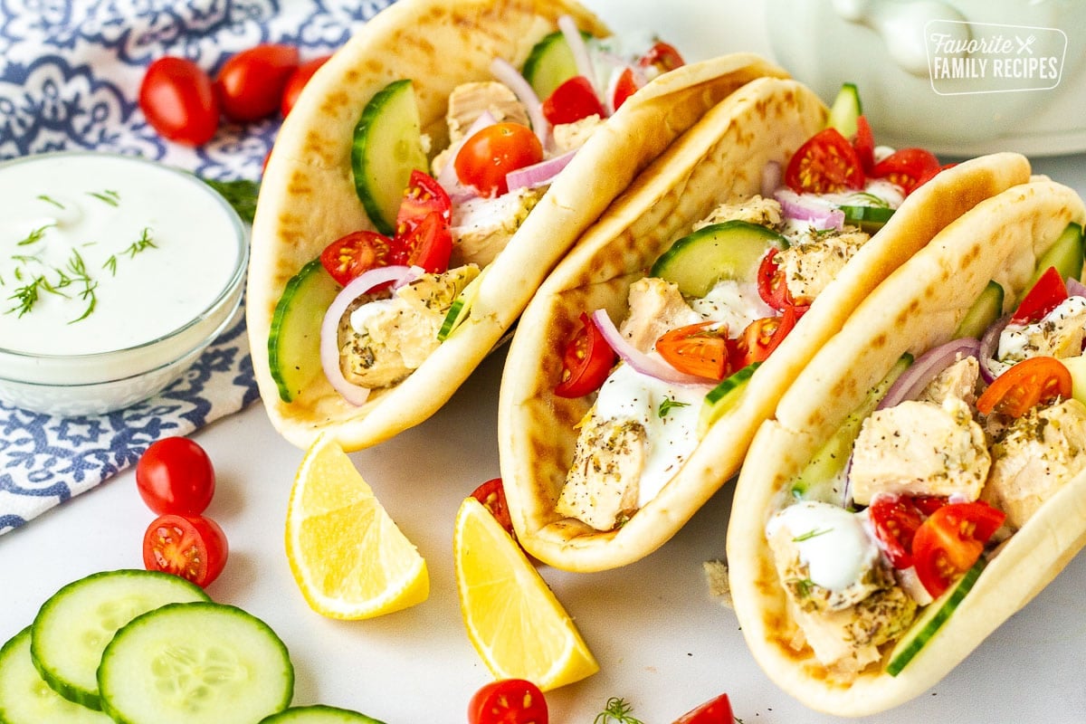 Three Chicken Gyro with tzatziki sauce.