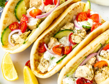 Chicken Gyro with tzatziki sauce, tomatoes, cucumbers, red onion and dill.